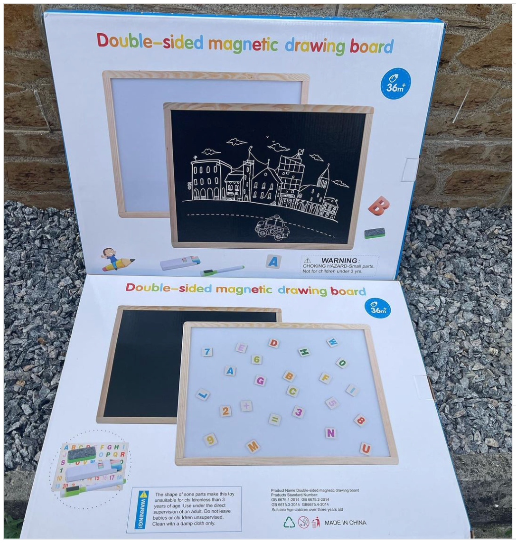 Double sided magnetic drawing board